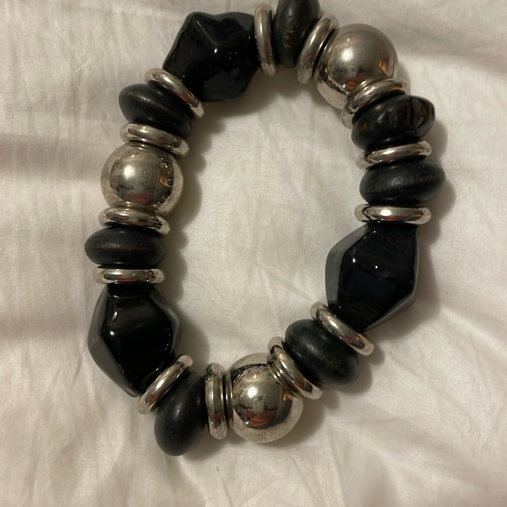 Black and silver bracelet with elastic string